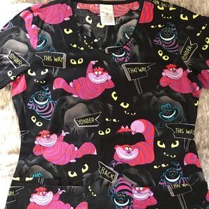 Disney glow in the dark scrub top size xs